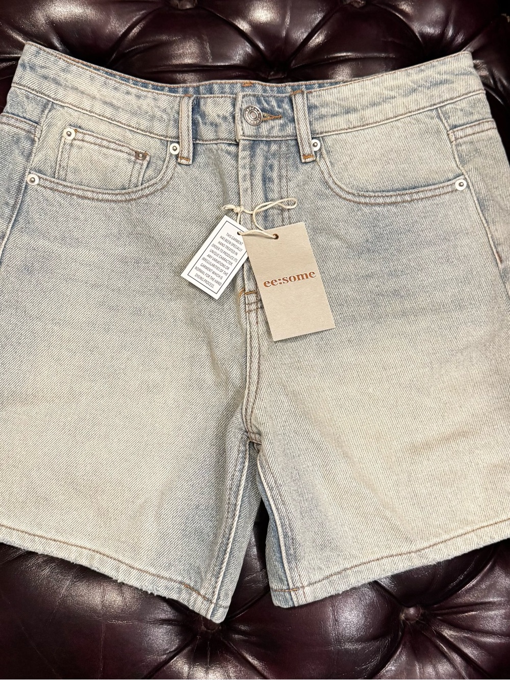 eesome Light Blue Denim Shorts with Gold Tag